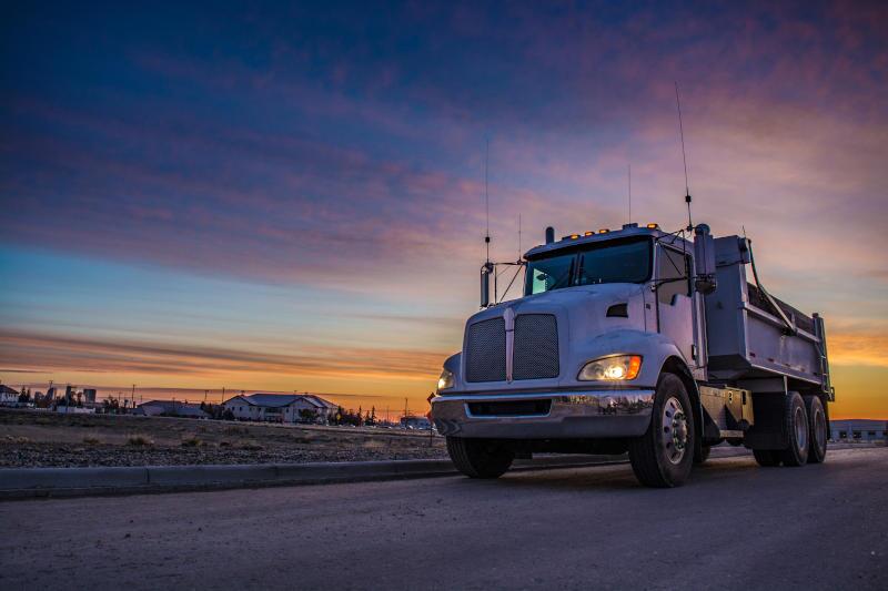 A pre-owned dump truck