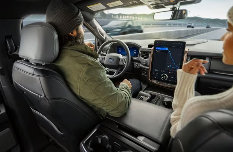 2025 Ford F-150 Lightning with a driver using hands-free driving