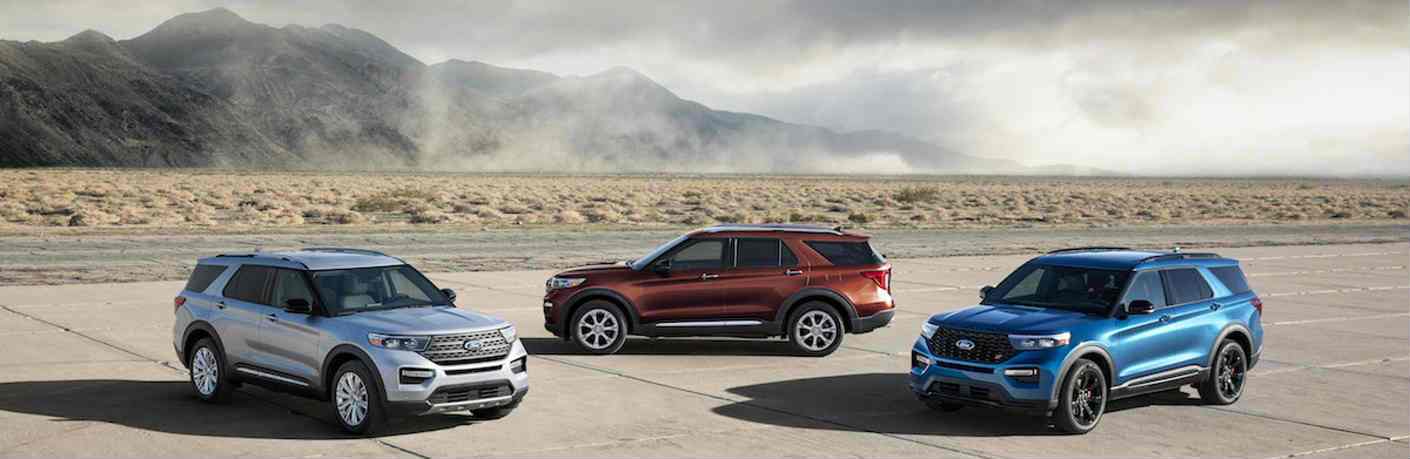 Ford Explorer lineup with misty mountains