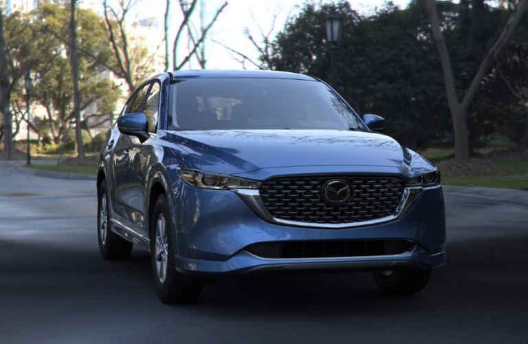 front view of the 2024 Mazda CX-5 2.5 S Select on the road