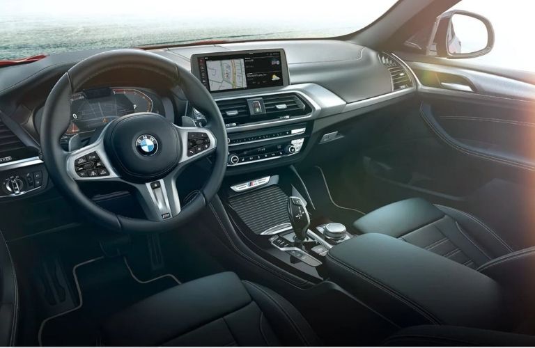 2021 BMW X4 steering wheel and dashboard
