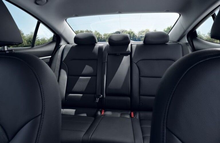 Black leathered second row of used Hyundai Elantra