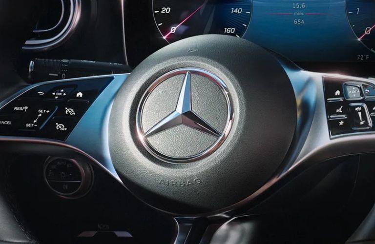 power steering wheel with buttons of the 2025 Mercedes-Benz C 300 4MATIC Sedan