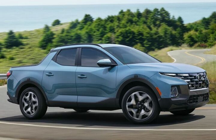 Side view of the 2023 Hyundai Santa Cruz Blue