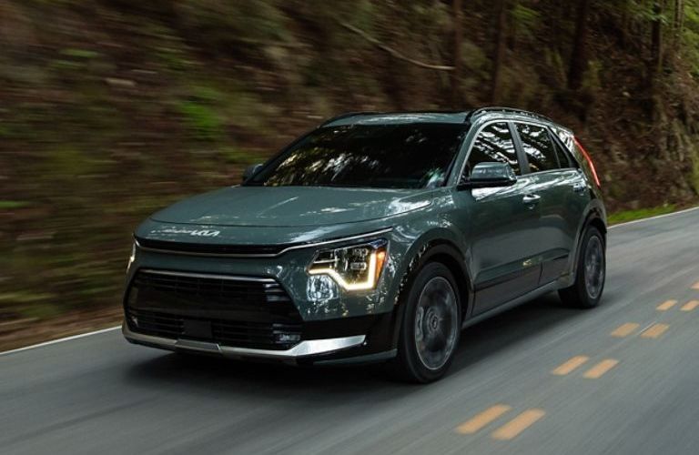 diagonal front view image of the 2025 Kia Niro Hybrid on a highway