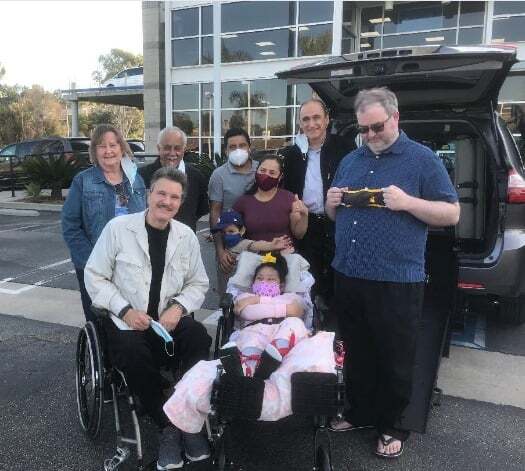 The Perez family pick up their new van from Aero Mobility