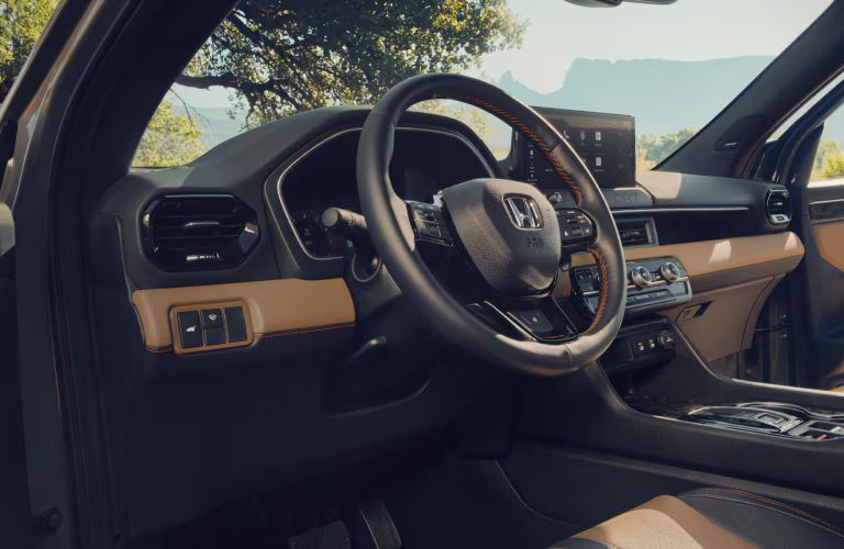 2025 Honda Passport steering and dash view