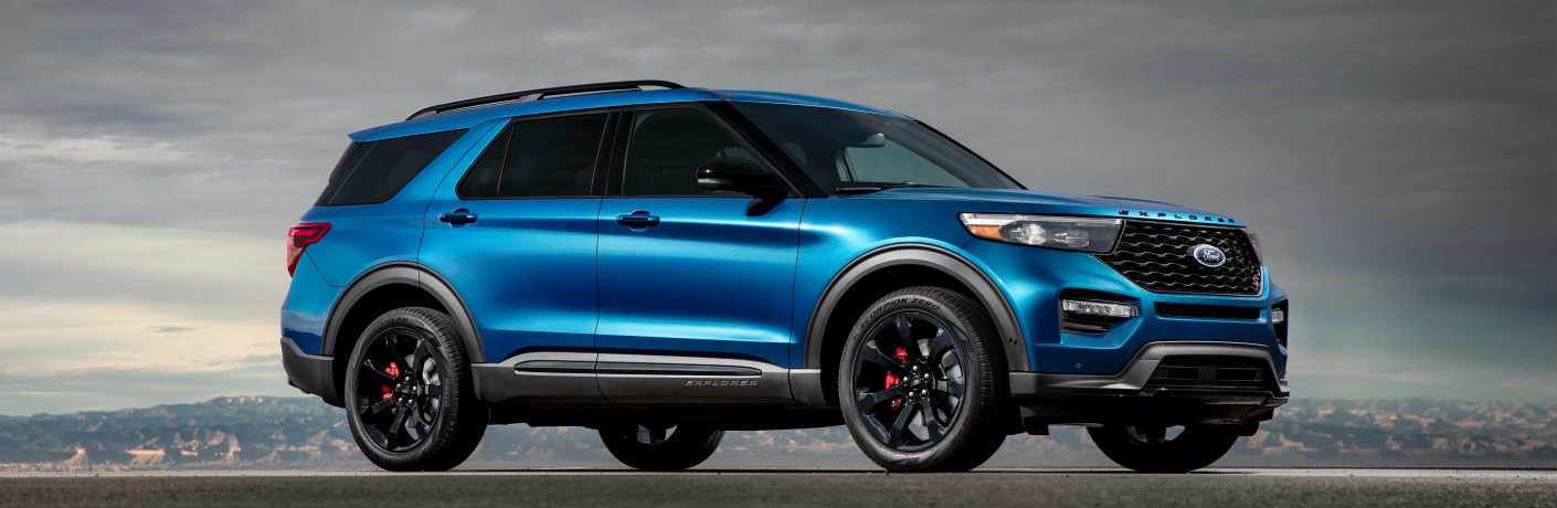Blue 2020 Ford Explorer ST on mountain background
