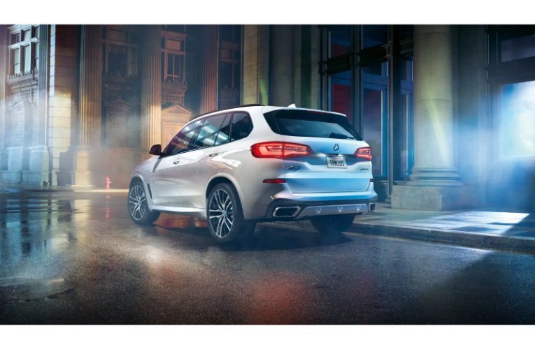 2020 BMW X5 view of back of vehicle white paint 2021 model shown
