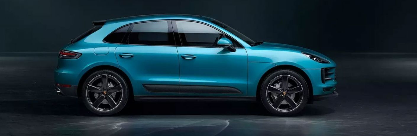 A blue 2021 Porsche Macan at rest