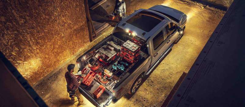 A top-down graphic of the 2025 Ford F-150 Lightning Flash at a work site