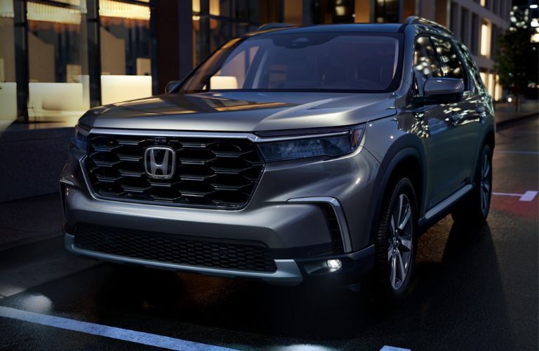 A 2023 Honda Pilot on a city road