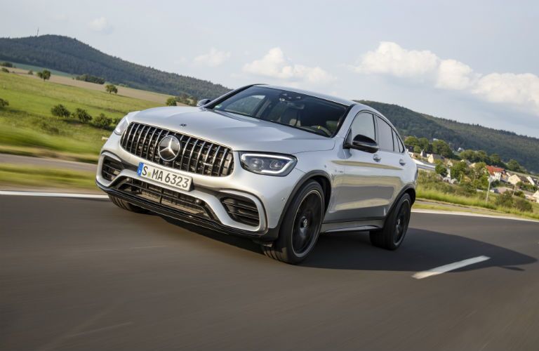 2020 MB GLC Coupe exterior front fascia and driver side going fast on country highway