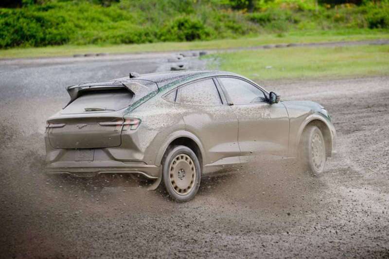 The 2024 Ford Mustang Mach-E Rally on a dirt track.