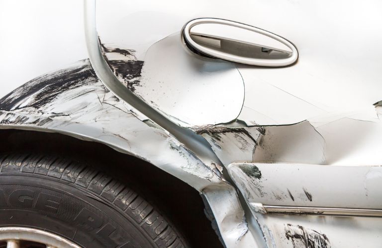 Vehicle dented and scratched