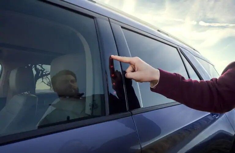 Man using pinpad to unlock 2020 Ford Explorer XLT door