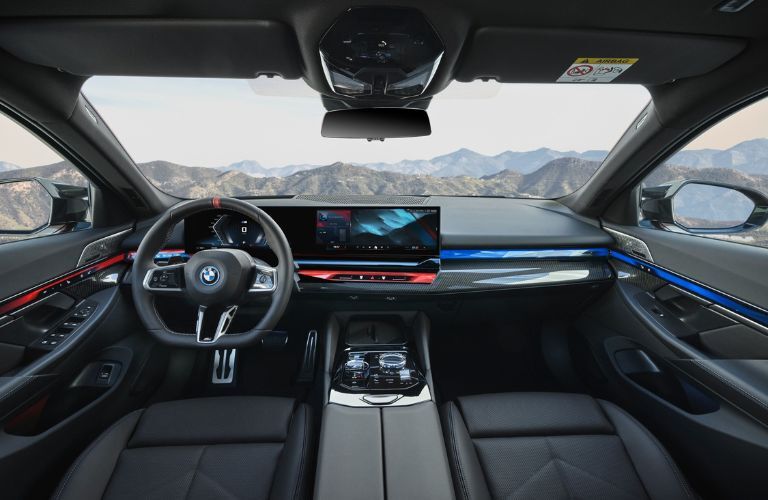 Cockpit and dashboard view of the 2024 BMW i5