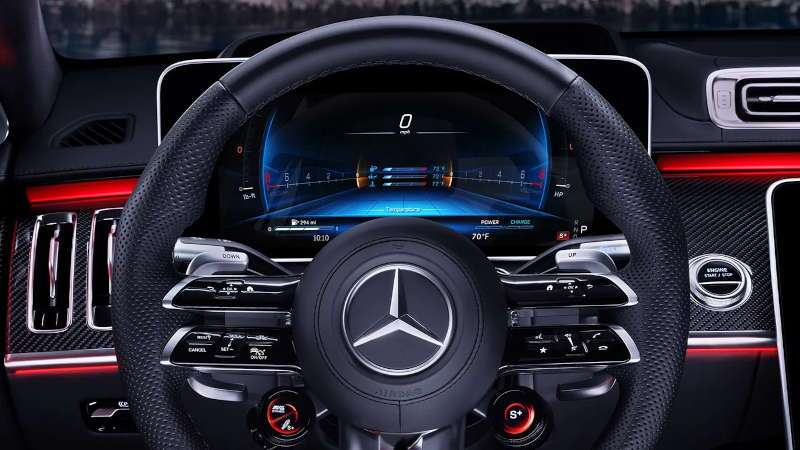 The controls and dashboard display in the 2026 Mercedes-AMG® S 63 E PERFORMANCE Sedan