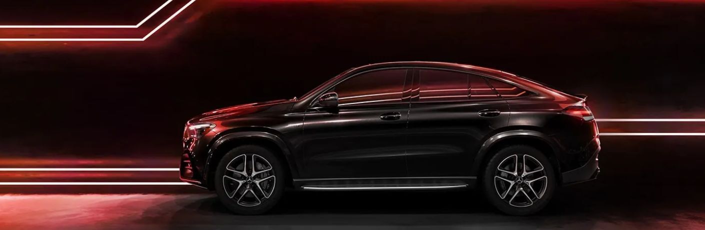 Side view of the 2024 Mercedes-Benz AMG® GLE 53 Coupe in Obsidian Black Metallic