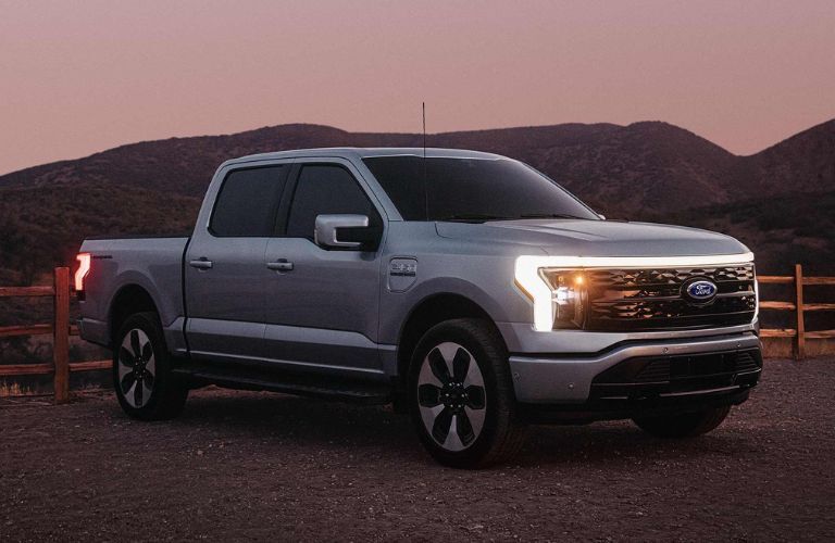 2025 Ford F-150 Lightning side and front view