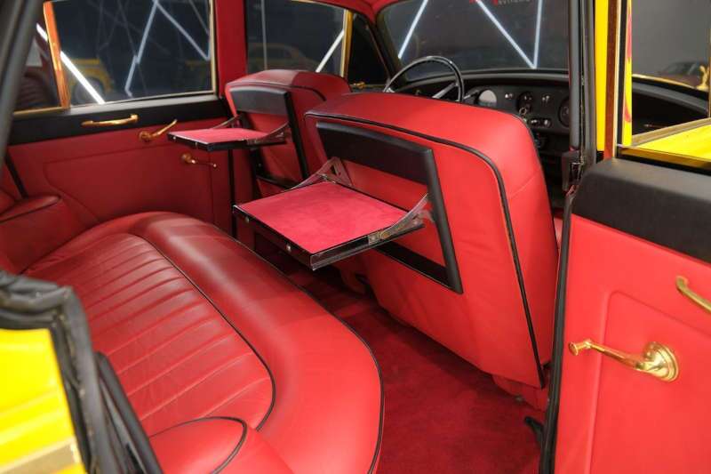 The rear seating with fold-down tables in the 1960 Rolls-Royce Silver Cloud II