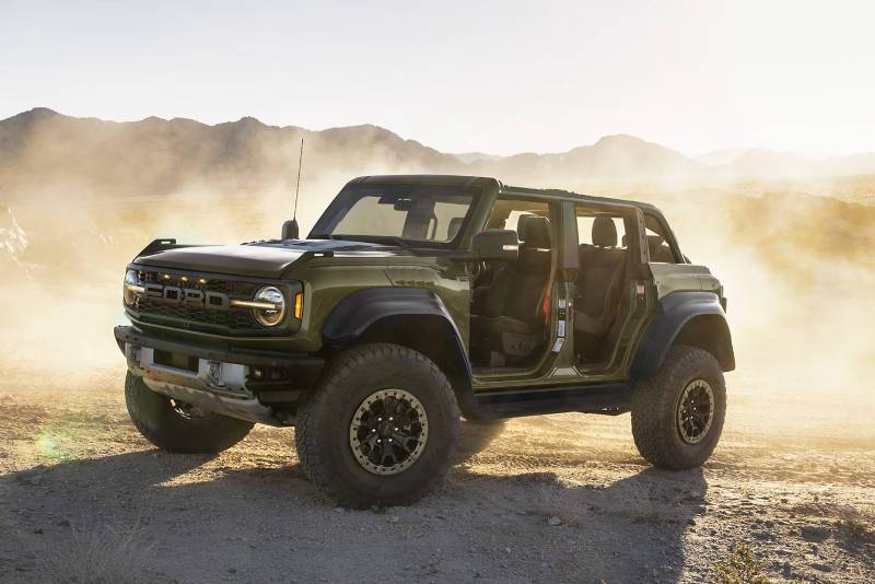 A front quarter view of the Ford Bronco with its doors removed for off-roading.