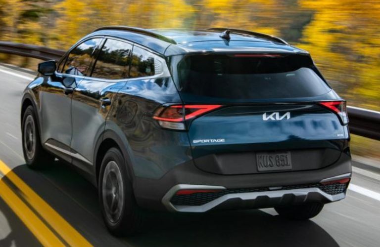 2023 Kia Sportage Hybrid side and back view
