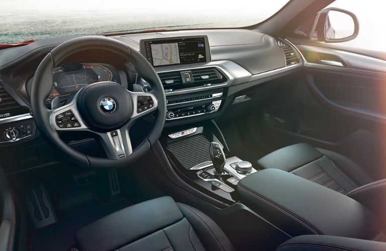 2020 BMW X4 interior dash and wheel view