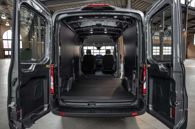 The interior cargo space of a 2026 Ford E-Transit cargo van upfitted for taking on heavy loads