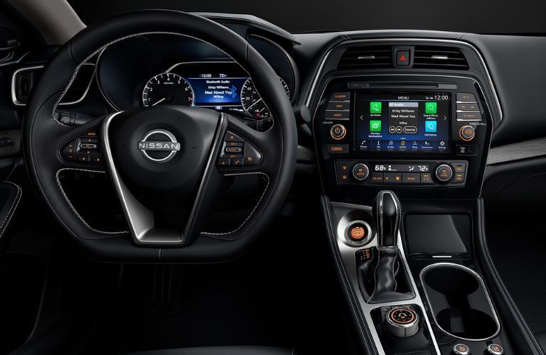 The steering wheel area of the 2022 Nissan Maxima is shown.