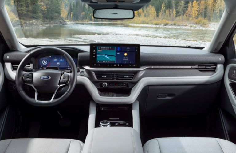 2025 Ford Explorer Platinum front seats facing a river
