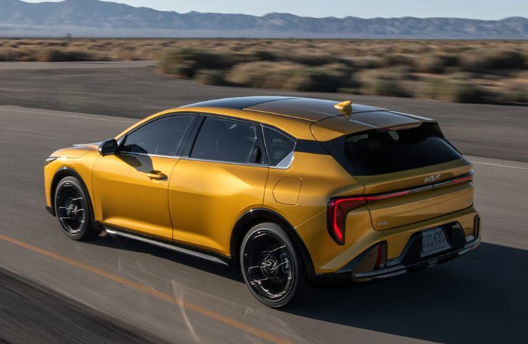 2026 Kia K4 Hatchback side and back view