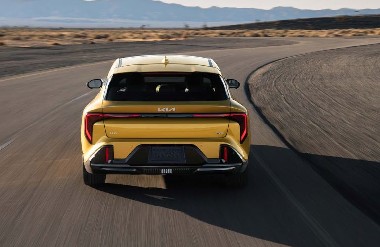 rear view of the 2026 Kia K4 on a road