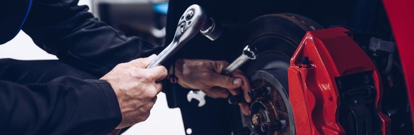 A mechanic working on a vehicle