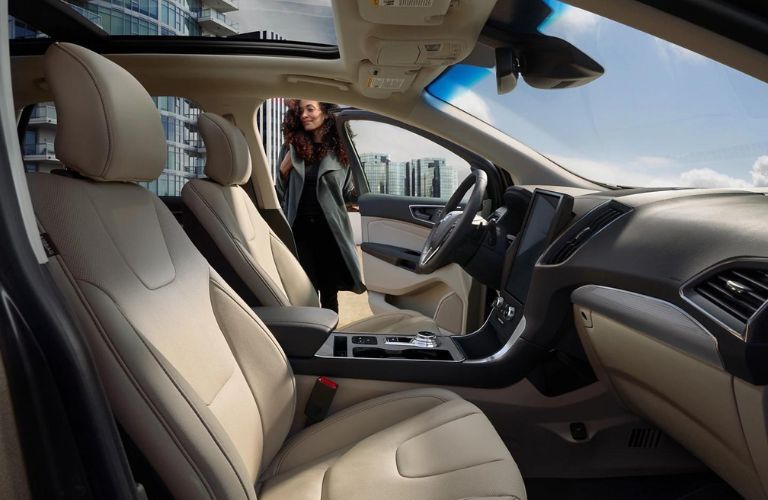 Interior seating area of a Ford Edge model is shown.