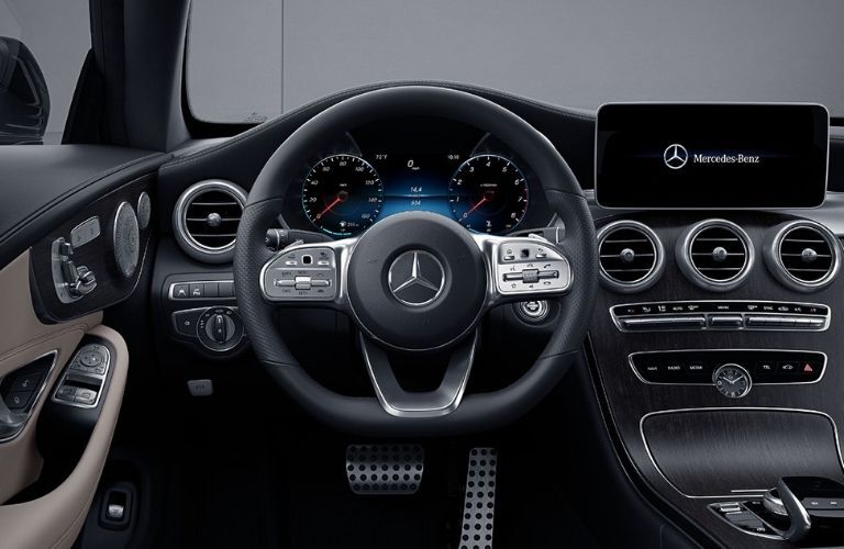 The steering wheel of the 2021 Mercedes-Benz C-Class Coupe.