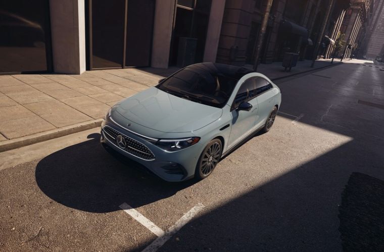 2027 Mercedes-Benz CLA 350 4MATIC® ELECTRIC Sedan exterior side view with open door