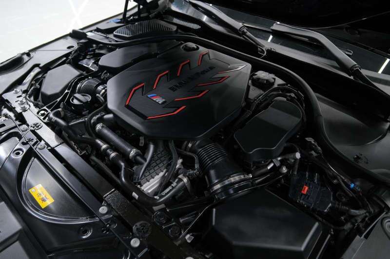 An engine compartment view of the BMW M5 Mansory