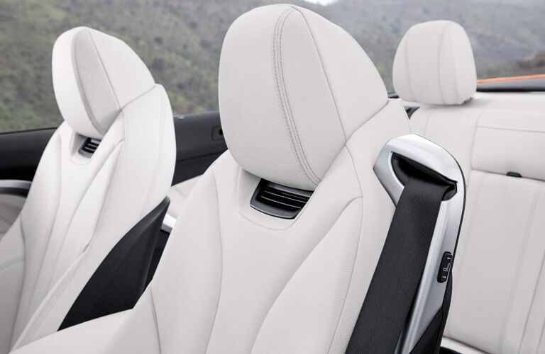 BMW 4 Series with open top, seats focused on