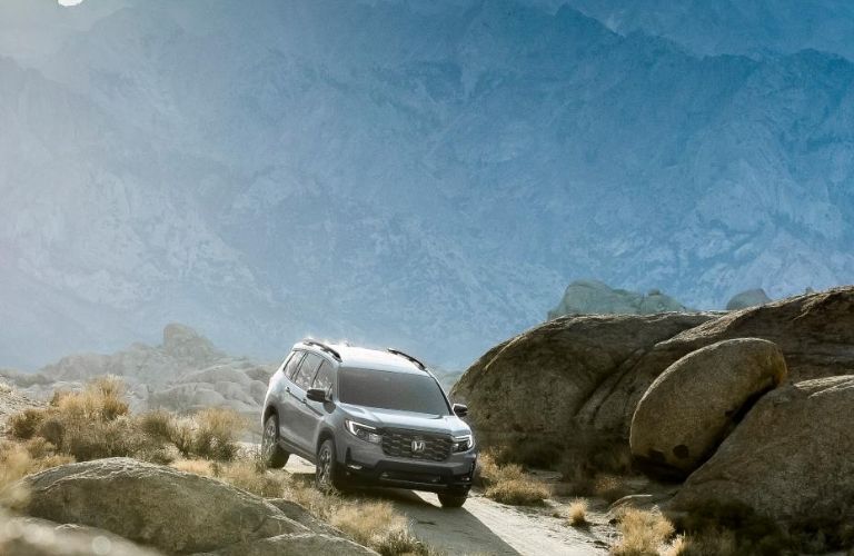The 2022 Passport off-roading through challenging terrains