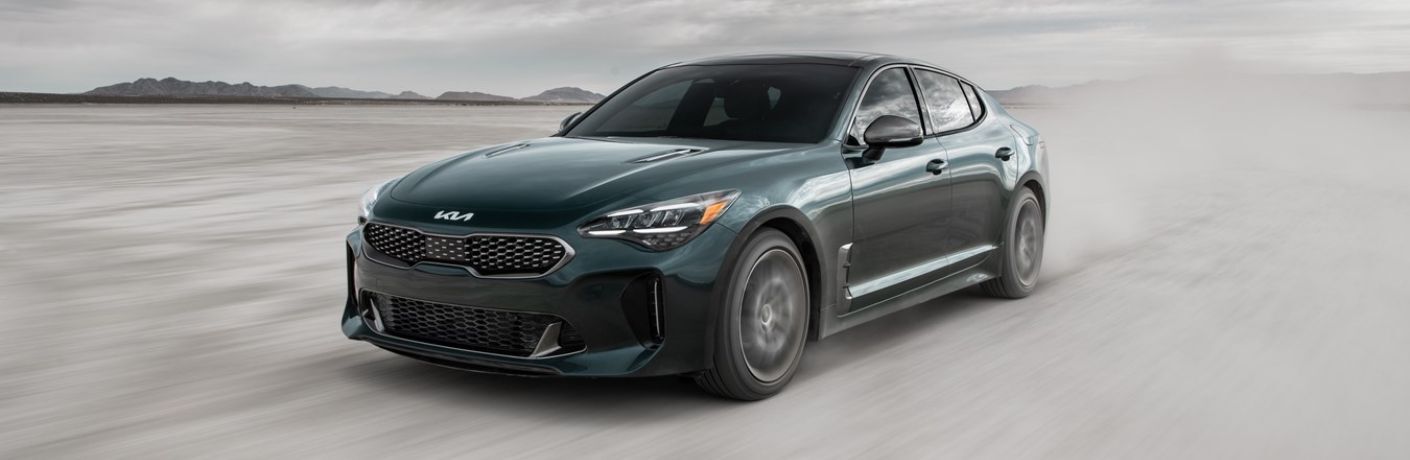 A 2023 Kia Stinger on a deserted land