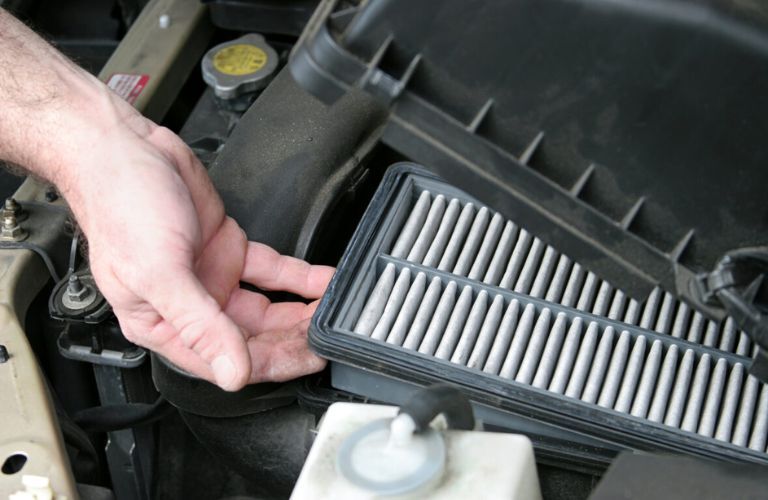 air filter replacement being undertaken