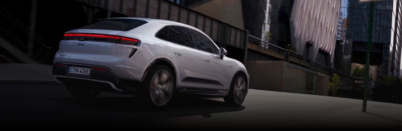 One white color 2025 Porsche Macan Turbo Electric