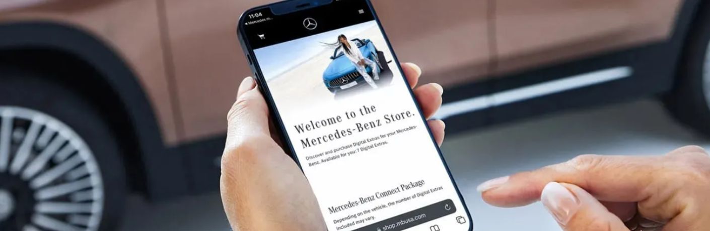 a hand using the Mercedes-Benz App
