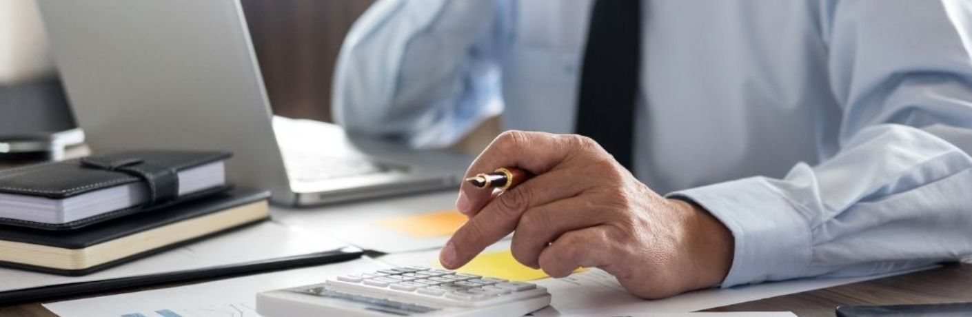 Hand of a man calculating