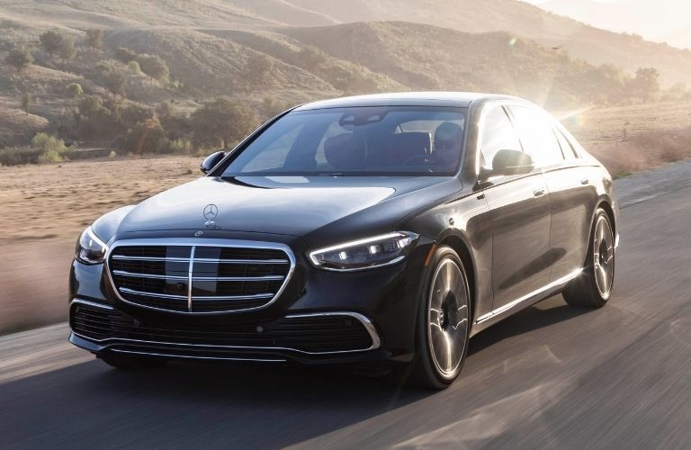 2021 Mercedes-Benz S 580 4MATIC Sedan passing by on road