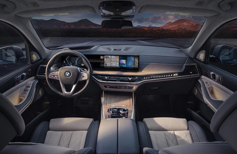 View from inside the first row of the 2022 BMW X7 showing its luxurious cockpit.