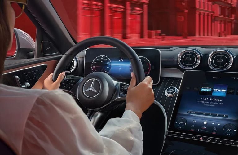 interior steering and dashboard of the 2025 Mercedes-Benz C 300 Sedan