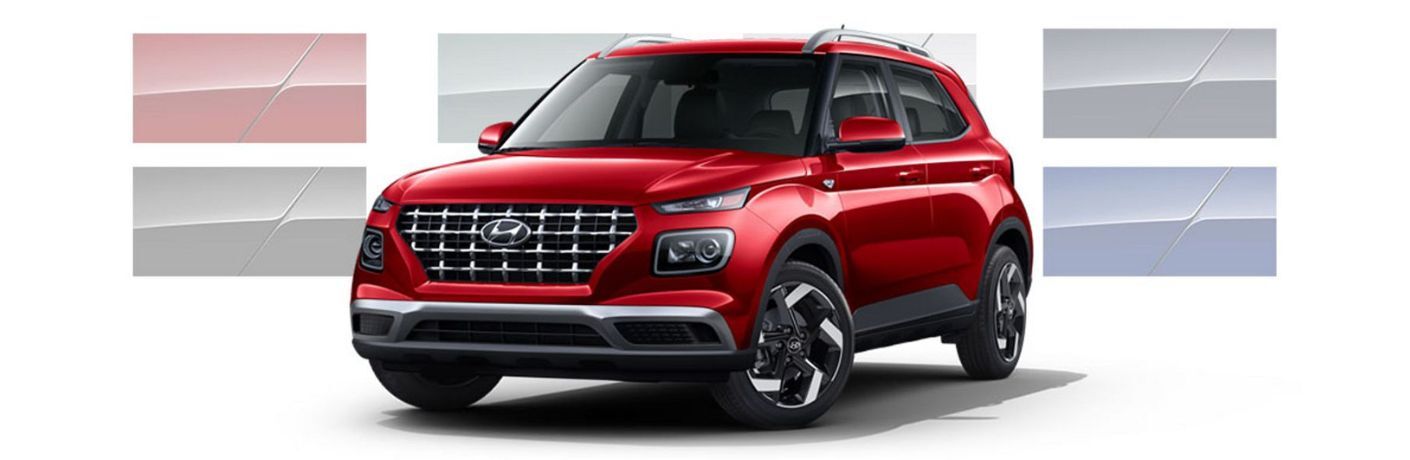 2026 Hyundai Venue with white background and red paint