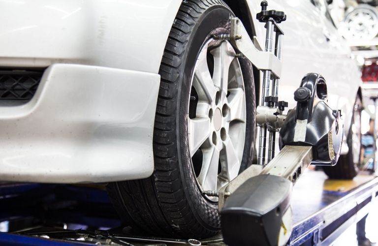 Car wheel that is undergoing wheel alignment